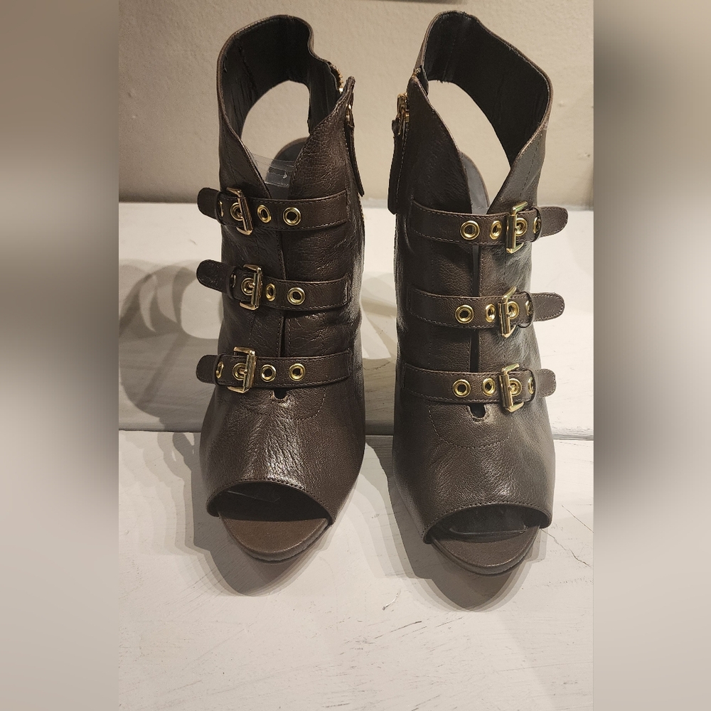 Nine West Mohawkit Ankle slingback bootie. Incredibly sexy and fun. NEVER Worn